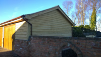 Brick and oak garage