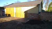 Brick and oak garage