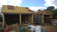 Oak cladding and roof tiles fitted