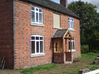 Re-claimed bricks to complement existing residence